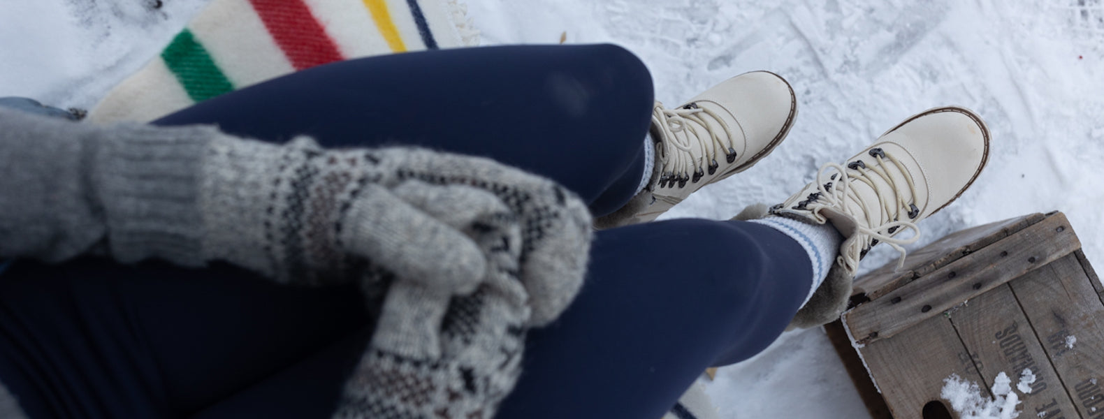 Woman wearing waterproof winter boots in the snow